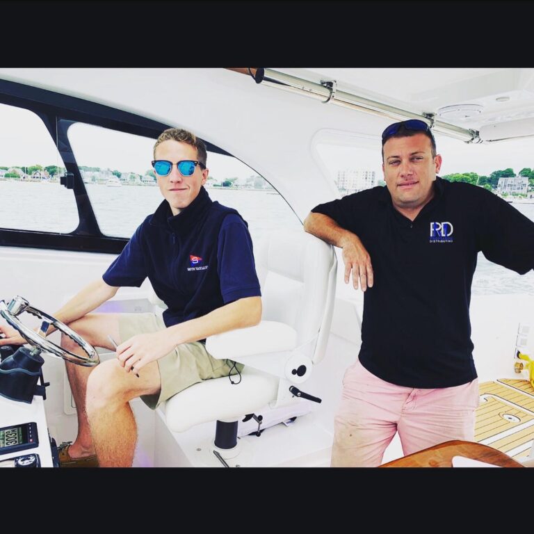 2 men driving a boat
