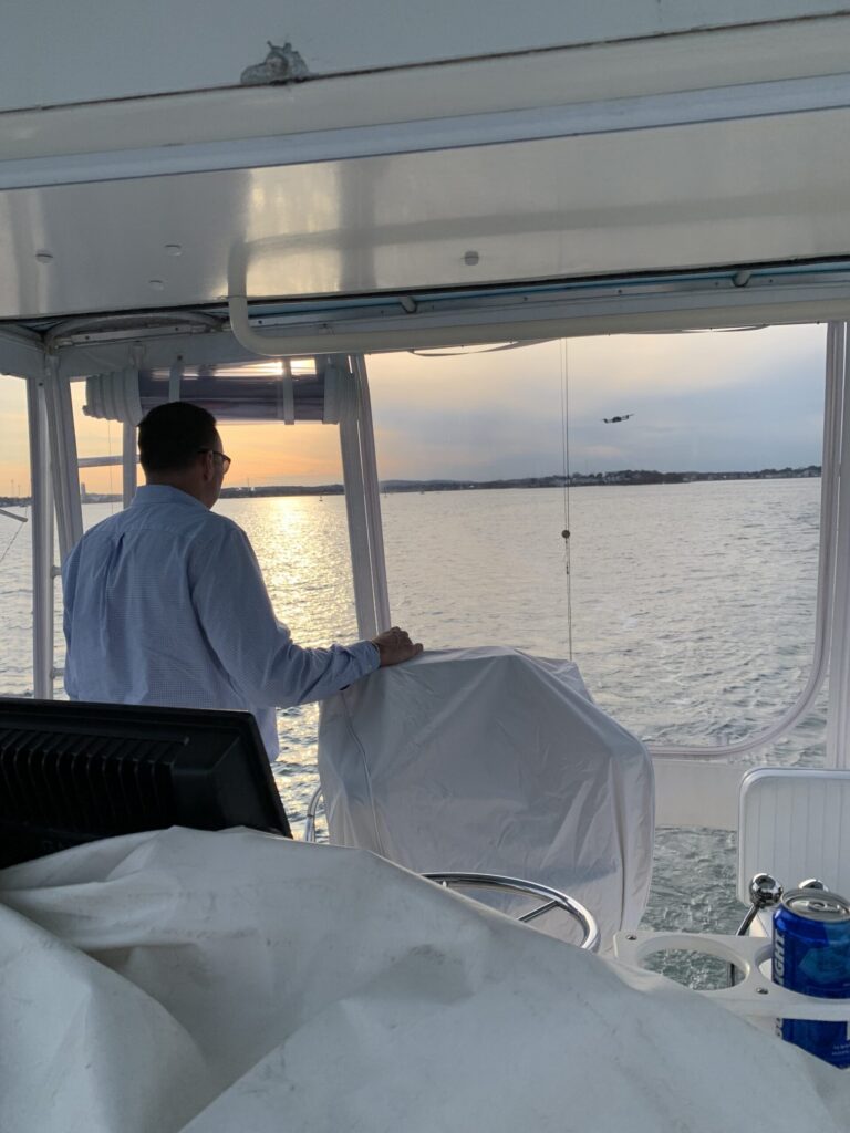 Captain driving a boat